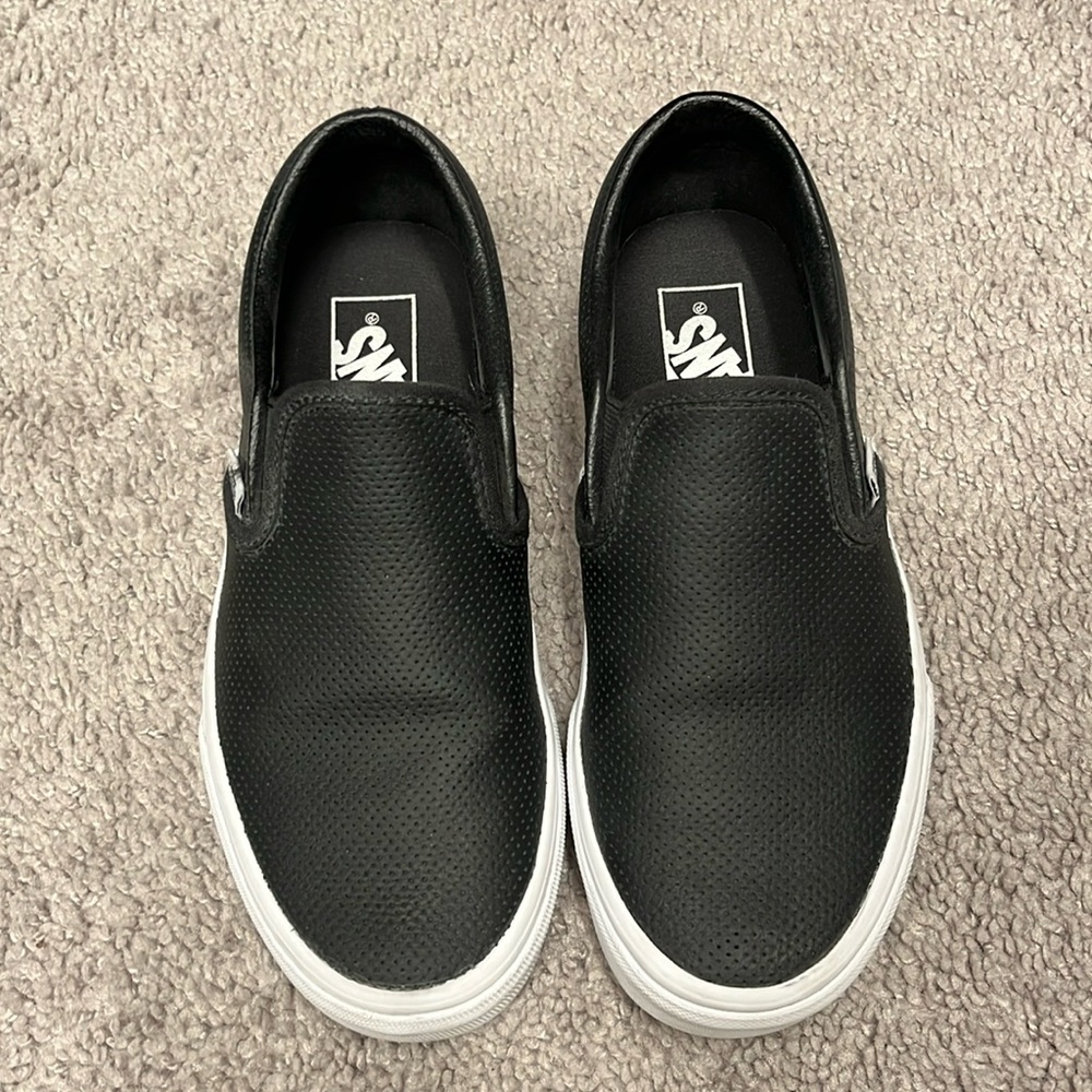 Vans Slip On Sneakers. Black. Faux perforated leather style.